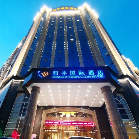 Peace International Hotel Shangrao Bagian luar foto