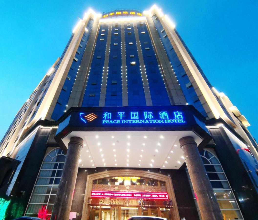 Peace International Hotel Shangrao Bagian luar foto