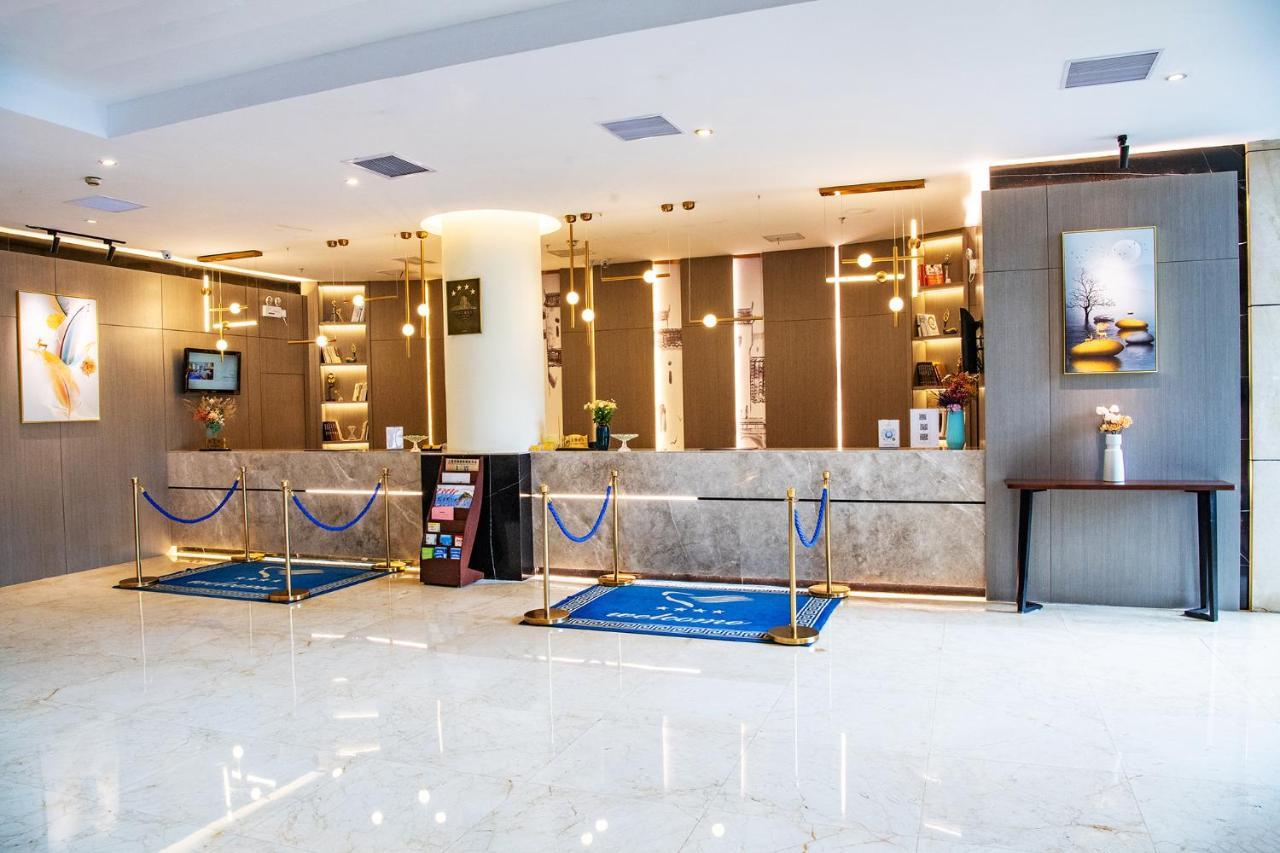 Peace International Hotel Shangrao Bagian luar foto