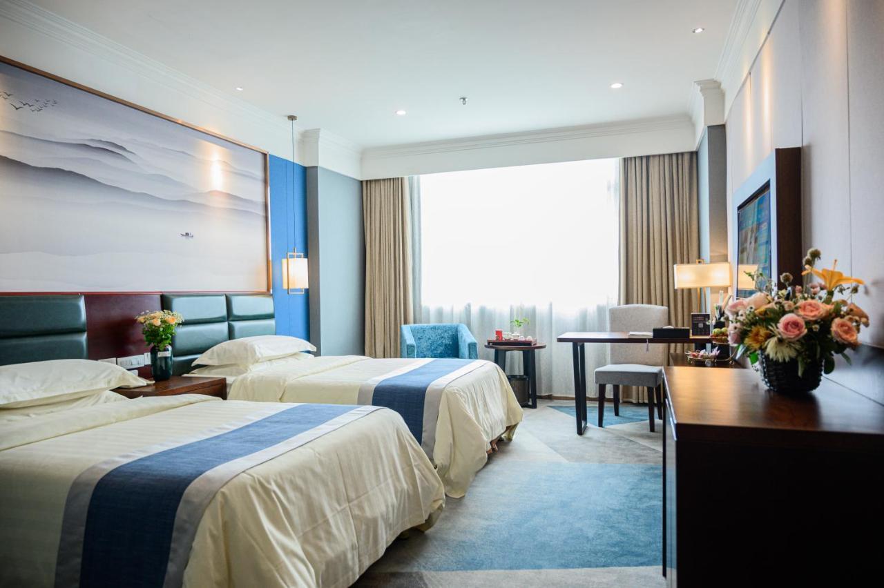 Peace International Hotel Shangrao Bagian luar foto