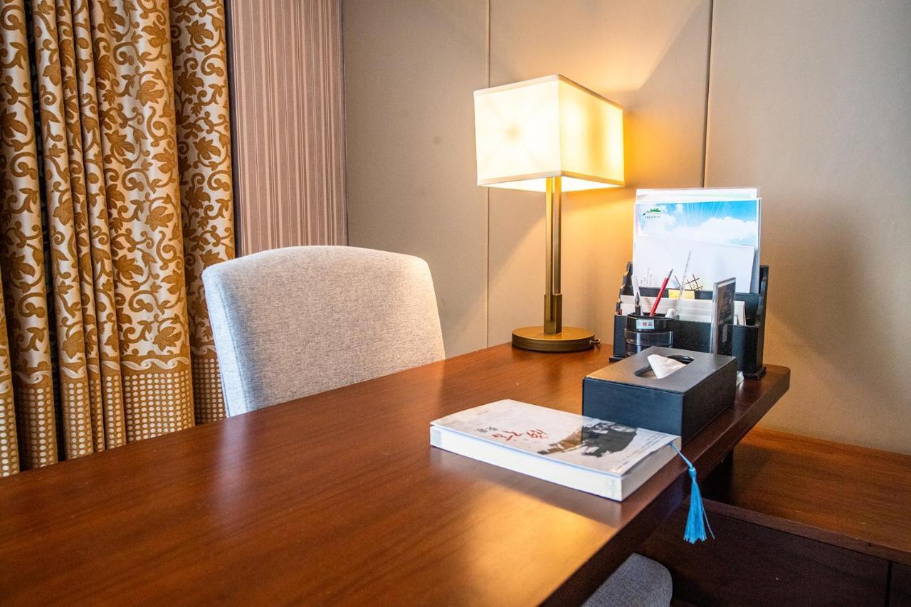 Peace International Hotel Shangrao Bagian luar foto