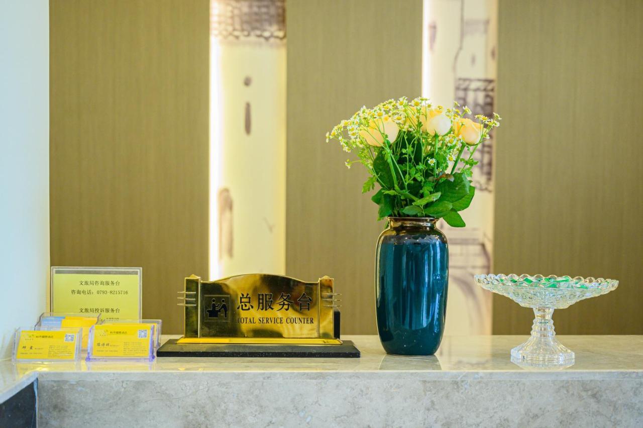 Peace International Hotel Shangrao Bagian luar foto
