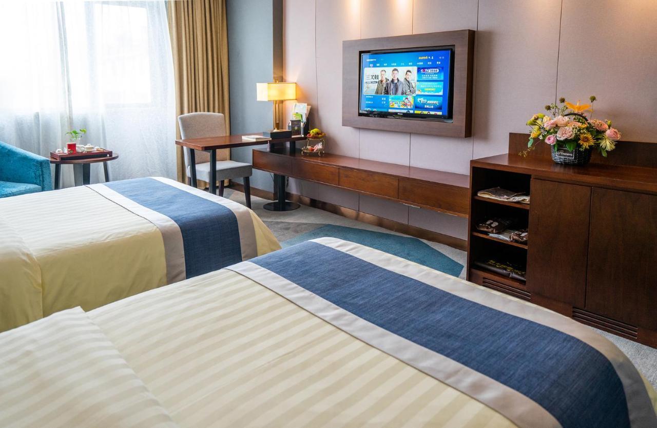 Peace International Hotel Shangrao Bagian luar foto